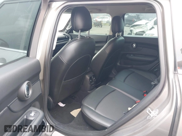 2016 MINI Clubman z VIN WMWLN5C56G2E30309, wystawiony jako IAAI lot #41772501 z przebiegiem 67 584 mil mil oraz . Historia ofert i sprzedaży dostępna na DreamBid. Obrazek 16.