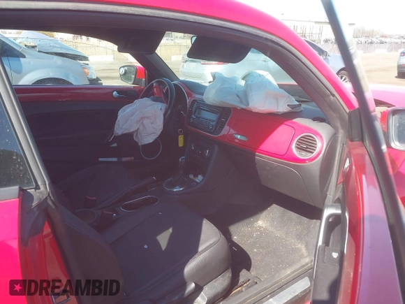 2012 Volkswagen Beetle 2.5L w/Sound/Nav PZEV with VIN 3VWJP7AT6CM620285, listed as a IAAI auction lot 42094101 with 125,737 mi miles and . Bid and sale history available at DreamBid. Image 5.