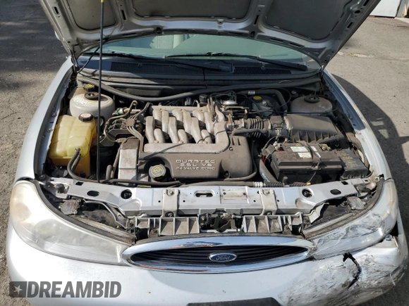 1998 Ford Contour LX with VIN 1FAFP66L2WK290948, listed as a Copart auction lot 56204295 with 76,307 mi miles and Salvage title. Bid and sale history available at DreamBid. Image 11.