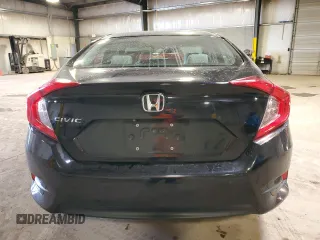2018 Honda Civic LX with VIN 19XFC2F5XJE204085, listed as a Copart auction lot 51323935 with 164,201 mi miles and Salvage Title. Bid and sale history available at carsss.com. Image 6.