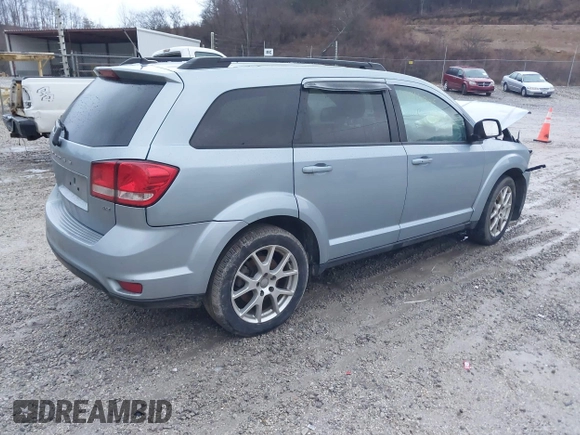 2013 Dodge Journey SXT with VIN 3C4PDDBG2DT579358, listed as a IAAI auction lot 41546005 with 167,489 mi miles and . Bid and sale history available at DreamBid. Image 4.