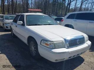 2008 Mercury Grand Marquis LS with VIN 2MEFM75V88X656857, listed as a IAAI auction lot 41789521 with 116,514 mi miles. Bid and sale history available at carsss.com. Image 1.