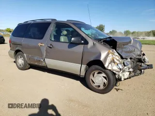 1998 Toyota Sienna LE with VIN 4T3ZF13C5WU049992, listed as a Copart auction lot 74492774 with 174,751 mi miles and Salvage Title. Bid and sale history available at carsss.com. Image 4.