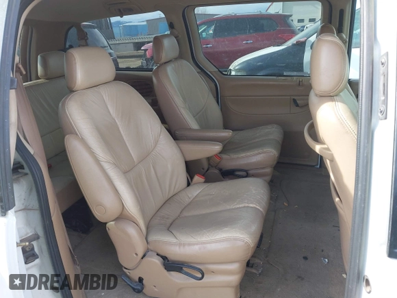 1997 Chrysler Town & Country with VIN 1C4GT64L7VB436658, listed as a IAAI auction lot 41823587 with 184,570 mi miles and . Bid and sale history available at DreamBid. Image 8.