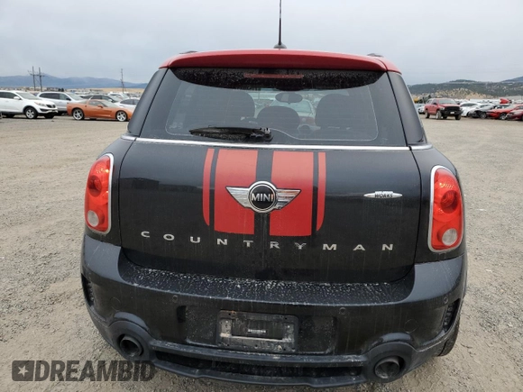 2016 MINI Countryman John Cooper Works with VIN WMWXD1C53GWS95325, listed as a Copart auction lot 77540424 with 98,951 mi miles and Salvage Title. Bid and sale history available at DreamBid. Image 6.