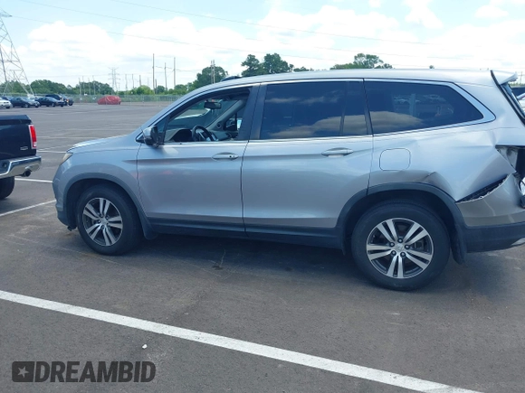 2018 Honda Pilot EX-L with VIN 5FNYF5H56JB003955, listed as a IAAI auction lot 42732433 with 116,613 mi miles and . Bid and sale history available at DreamBid. Image 14.
