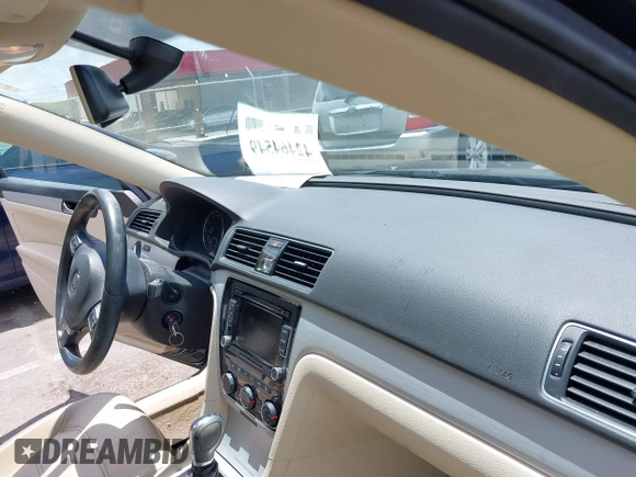 2013 Volkswagen Passat SE with VIN 1VWBP7A34DC114543, listed as a IAAI auction lot 42464549 with 111,146 mi miles and . Bid and sale history available at DreamBid. Image 5.