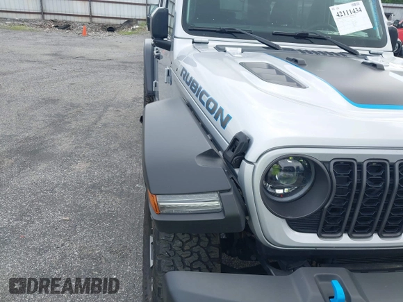 2024 Jeep Wrangler Rubicon with VIN 1C4RJXR61RW224506, listed as a IAAI auction lot 42111434 with 33,689 mi miles and . Bid and sale history available at DreamBid. Image 6.
