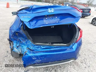 2020 Honda Civic LX with VIN 2HGFC2F69LH550744, listed as a IAAI auction lot 42079594 with 34,724 mi miles and . Bid and sale history available at DreamBid. Image 6.