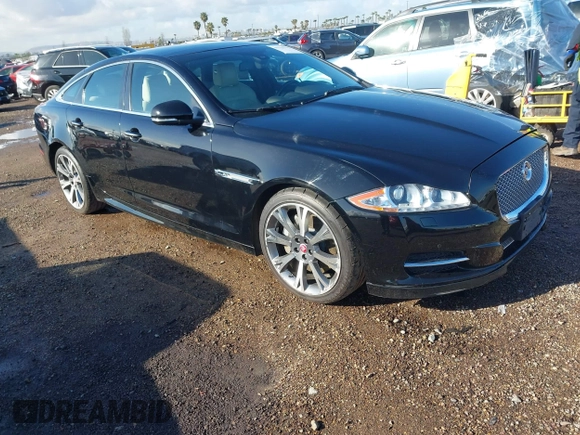 2015 Jaguar XJ with VIN SAJWA1CZ2F8V84677, listed as a IAAI auction lot 41723372 with 52,888 mi miles. Bid and sale history available at carsss.com. Image 1.