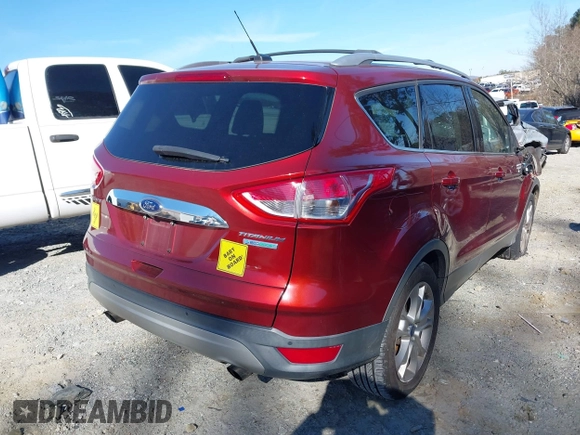 2015 Ford Escape Titanium with VIN 1FMCU0J92FUB55712, listed as a IAAI auction lot 41627867 with 156,438 mi miles. Bid and sale history available at carsss.com. Image 4.