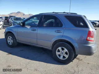 2005 Kia Sorento LX with VIN KNDJD733X55410306, listed as a Copart auction lot 45815005 with 104,153 mi miles and Salvage Title. Bid and sale history available at carsss.com. Image 2.
