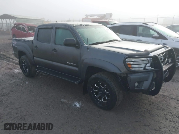 2015 Toyota Tacoma with VIN 3TMLU4EN7FM201302, listed as a IAAI auction lot 41666606 with 200,504 mi miles and . Bid and sale history available at DreamBid. Image 1.