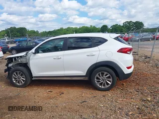 2017 Hyundai Tucson SE z VIN KM8J23A49HU580043, wystawiony jako IAAI lot #42181640 z przebiegiem 113 976 mil mil oraz . Historia ofert i sprzedaży dostępna na DreamBid. Obrazek 14.