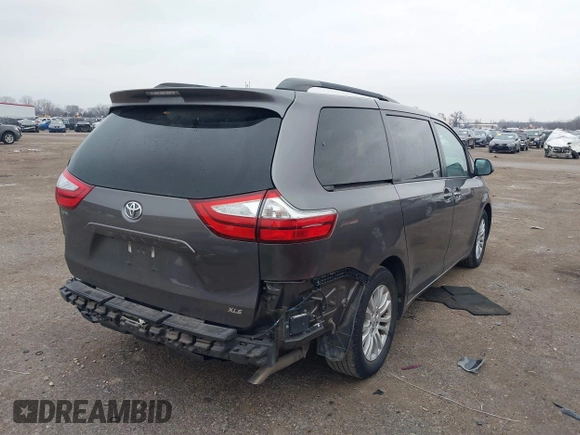 2016 Toyota Sienna XLE with VIN 5TDYK3DC8GS704330, listed as a IAAI auction lot 41586880 with 84,065 mi miles. Bid and sale history available at carsss.com. Image 4.