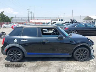 2015 MINI Hardtop 4 Door S z VIN WMWXU3C58F2B66601, wystawiony jako IAAI lot #42444404 z przebiegiem 76 174 mil mil oraz . Historia ofert i sprzedaży dostępna na DreamBid. Obrazek 14.