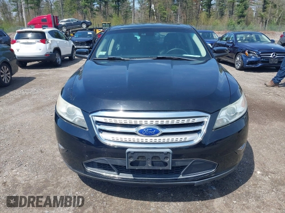 2011 Ford Taurus SHO z VIN 1FAHP2KT7BG188095, wystawiony jako IAAI lot #42180454 z przebiegiem 161 656 mil mil oraz . Historia ofert i sprzedaży dostępna na DreamBid. Obrazek 6.