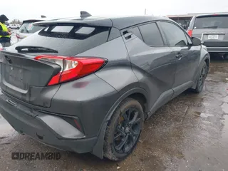 2021 Toyota C-HR LE with VIN JTNKHMBX0M1129080, listed as a IAAI auction lot 41321604 with 52,916 mi miles. Bid and sale history available at carsss.com. Image 4.