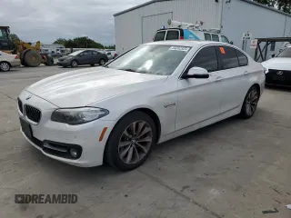 2016 BMW 5 Series 528i with VIN WBA5A5C57GG352367, listed as a Copart auction lot 54202325 with 90,284 mi miles and Salvage title. Bid and sale history available at DreamBid. Image 1.