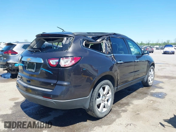 2017 Chevrolet Traverse LT with VIN 1GNKRGKD7HJ129888, listed as a IAAI auction lot 42009764 with 136,091 mi miles and . Bid and sale history available at DreamBid. Image 4.