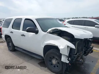 2013 Chevrolet Tahoe Commercial z VIN 1GNLC2E0XDR253196, wystawiony jako IAAI lot #42046330 z przebiegiem 156 135 mil mil oraz . Historia ofert i sprzedaży dostępna na DreamBid. Obrazek 1.