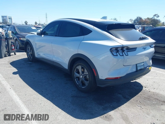 2021 Ford Mustang Mach-E Select z VIN 3FMTK1RM7MMA57653, wystawiony jako IAAI lot #41822938 z przebiegiem 23 581 mil mil oraz . Historia ofert i sprzedaży dostępna na DreamBid. Obrazek 3.
