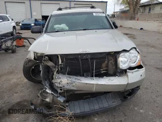 2010 Jeep Grand Cherokee Laredo with VIN 1J4PR4GK8AC111117, listed as a Copart auction lot 48947915 with 152,293 mi miles and Salvage Title. Bid and sale history available at carsss.com. Image 5.