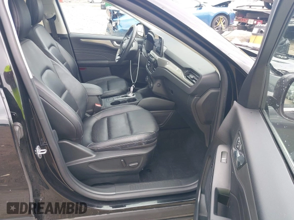 2021 Ford Escape Titanium Hybrid z VIN 1FMCU0DZ0MUA16798, wystawiony jako IAAI lot #42502086 z przebiegiem 107 250 mil mil oraz . Historia ofert i sprzedaży dostępna na DreamBid. Obrazek 5.