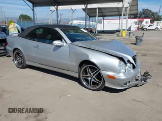 2000 Mercedes-Benz CLK with VIN WDBLK65G7YT051620, listed as a IAAI auction lot 41870818 with 141,676 mi miles. Bid and sale history available at carsss.com. Image 1.
