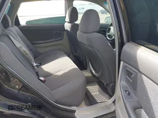 2005 Kia Spectra with VIN KNAFE161555093364, listed as a IAAI auction lot 41465930 with 190,769 mi miles. Bid and sale history available at carsss.com. Image 8.