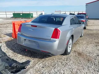 2018 Chrysler 300 Touring with VIN 2C3CCAAG9JH117437, listed as a IAAI auction lot 41213527 with 126,846 mi miles and . Bid and sale history available at DreamBid. Image 4.