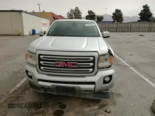 2015 GMC Canyon 4WD SLE with VIN 1GTH6BE34F1237917, listed as a Copart auction lot 47091685 with 173,063 mi miles and Salvage Title. Bid and sale history available at carsss.com. Image 11.