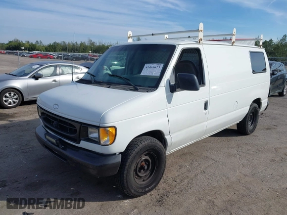 2001 Ford Econoline Cargo with VIN 1FTRE14291HA84414, listed as a IAAI auction lot 41463623 with 192,835 mi miles. Bid and sale history available at carsss.com. Image 2.