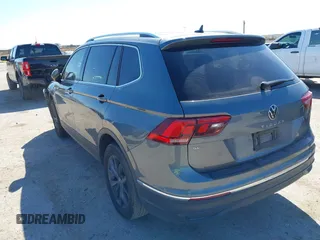 2023 Volkswagen Tiguan SE with VIN 3VV3B7AX5PM142378, listed as a IAAI auction lot 41835204 with 13,670 mi miles and . Bid and sale history available at DreamBid. Image 3.