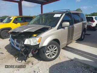 2014 Dodge Grand Caravan SXT with VIN 2C4RDGCG8ER244201, listed as a IAAI auction lot 42017091 with 161,653 mi miles and . Bid and sale history available at DreamBid. Image 18.