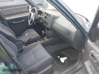 1998 Toyota RAV4 with VIN JT3GP10V5W0026814, listed as a IAAI auction lot 42003456 with 196,842 mi miles. Bid and sale history available at carsss.com. Image 5.