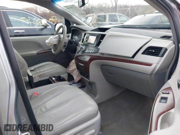 2013 Toyota Sienna XLE with VIN 5TDDK3DC7DS056599, listed as a IAAI auction lot 41736510 with 120,230 mi miles and . Bid and sale history available at DreamBid. Image 5.