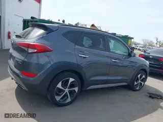 2018 Hyundai Tucson Value with VIN KM8J3CA24JU646807, listed as a IAAI auction lot 41960629 with 117,646 mi miles. Bid and sale history available at carsss.com. Image 13.