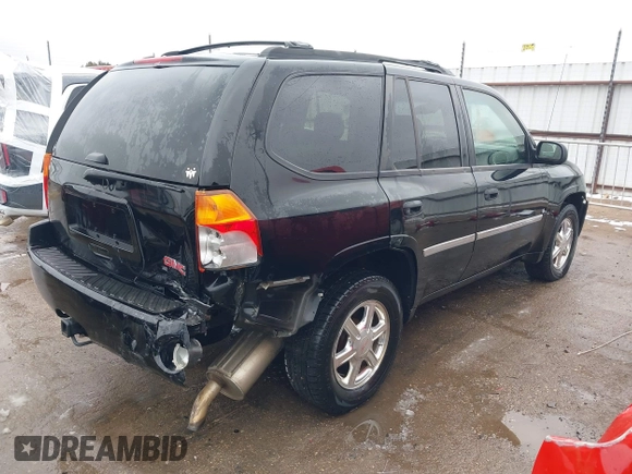 2008 GMC Envoy SLE1 with VIN 1GKDS13S282118764, listed as a IAAI auction lot 41285146 with 109,603 mi miles and . Bid and sale history available at DreamBid. Image 4.