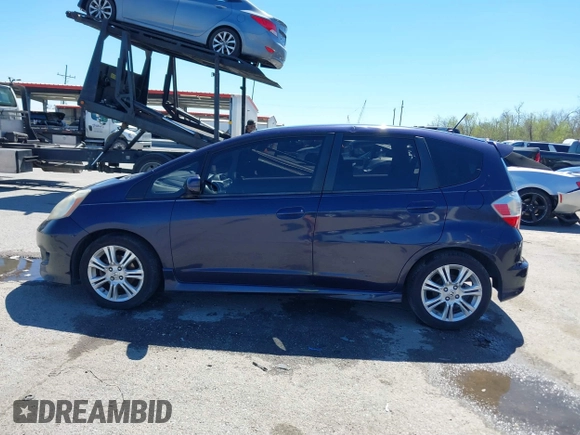 2009 Honda Fit Sport with VIN JHMGE88479S007307, listed as a IAAI auction lot 41801827 with 212,998 mi miles. Bid and sale history available at carsss.com. Image 14.