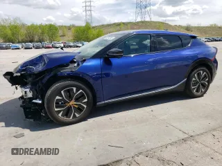 2024 Kia EV6 Wind z VIN KNDC3DLC0R5209580, wystawiony jako Copart lot #56254245 z przebiegiem 3 935 mil mil oraz Szkoda całkowita • Salvage title. Historia ofert i sprzedaży dostępna na DreamBid. Obrazek 1.
