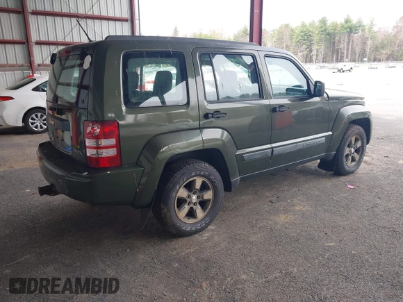 2008 Jeep Liberty Sport with VIN 1J8GN28K98W232003, listed as a IAAI auction lot 42127476 with 129,286 mi miles. Bid and sale history available at carsss.com. Image 4.