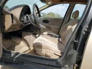 1998 Saturn SL with VIN 1G8ZK5270WZ240303, listed as a Copart auction lot 65364164 with 156,699 mi miles and Salvage title. Bid and sale history available at DreamBid. Image 7.
