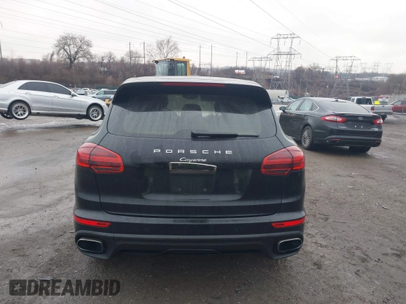 2016 Porsche Cayenne with VIN WP1AA2A28GLA06519, listed as a IAAI auction lot 41520326 with 144,828 mi miles. Bid and sale history available at carsss.com. Image 17.