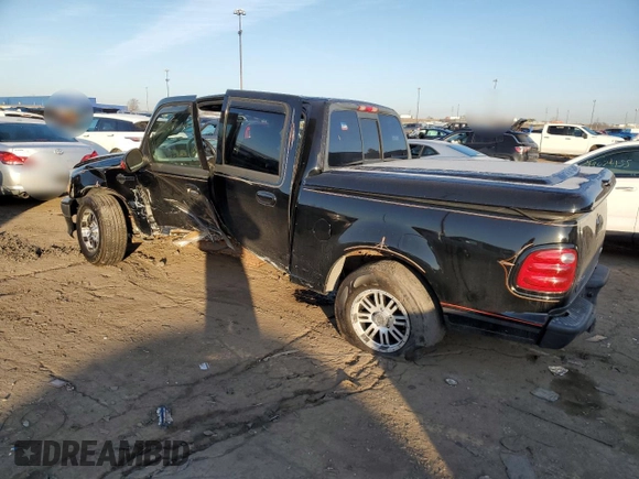 2001 Ford F-150 SuperCrew XLT with VIN 1FTRW07L71KA04123, listed as a Copart auction lot 48477755 with 128,808 mi miles and Clean Title. Bid and sale history available at carsss.com. Image 2.