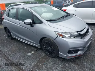 2018 Honda Fit Sport z VIN 3HGGK5H64JM708668, wystawiony jako IAAI lot #42280273 z przebiegiem 31 350 mil mil oraz . Historia ofert i sprzedaży dostępna na DreamBid. Obrazek 1.