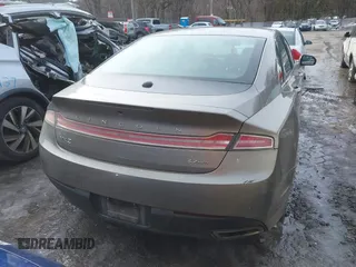 2015 Lincoln MKZ z VIN 3LN6L2JK4FR610596, wystawiony jako IAAI lot #41443285 z przebiegiem 114 363 mil mil oraz . Historia ofert i sprzedaży dostępna na DreamBid. Obrazek 16.