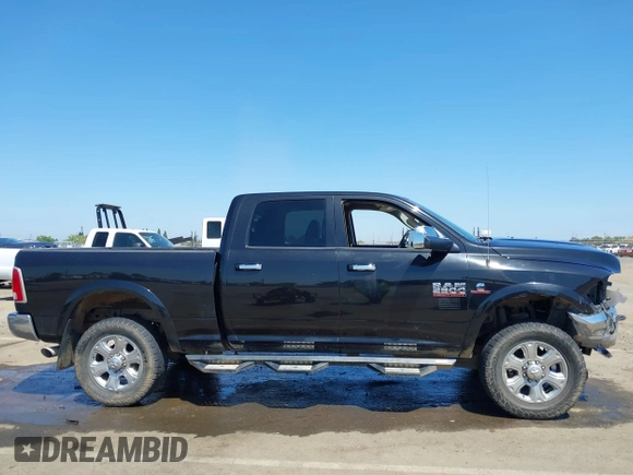 2015 Ram 2500 Laramie with VIN 3C6UR5FL4FG651469, listed as a IAAI auction lot 42179544 with 190,222 mi miles and . Bid and sale history available at DreamBid. Image 13.