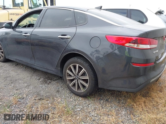 2019 Kia Optima LX z VIN 5XXGT4L38KG319215, wystawiony jako IAAI lot #42226251 z przebiegiem 70 449 mil mil oraz . Historia ofert i sprzedaży dostępna na DreamBid. Obrazek 3.