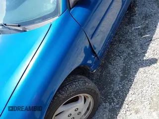 1999 Ford Escort Cool with VIN 3FAKP1133XR217299, listed as a IAAI auction lot 42625949 with 139,216 mi miles and . Bid and sale history available at DreamBid. Image 17.